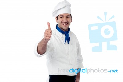 Young Chef Showing Double Thumbs Up Stock Photo