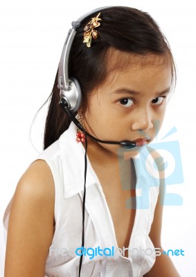 Young Child With Headset Stock Photo