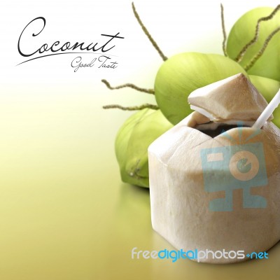 Young Coconut On Solid Background Stock Photo