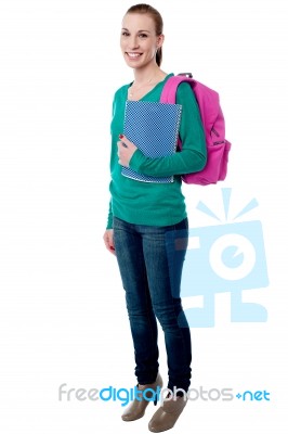 Young College Girl Posing With Backpack Stock Photo