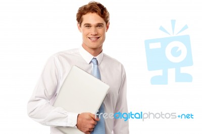 Young Consultant With His Laptop Stock Photo