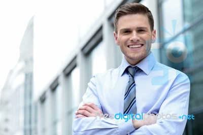 Young Corporate Man Posing Confidently Stock Photo