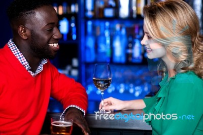 Young Couple At Bar Stock Photo