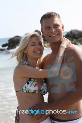 Young Couple at beach Stock Photo