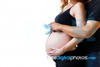 Young Couple Expecting Baby. Isolated On White Stock Photo