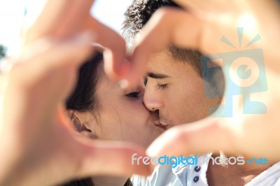 Young Couple Having Fun In A Park Stock Photo