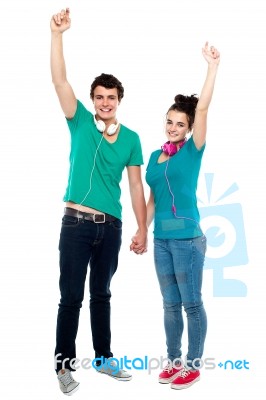 Young Couple Holding Hands Stock Photo