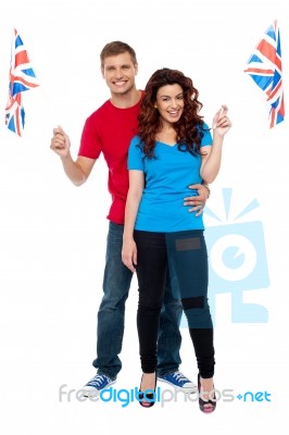 Young Couple Holding UK Flag Stock Photo