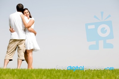 Young Couple Hug Stock Photo