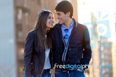 Young Couple In Love On The Street Stock Photo