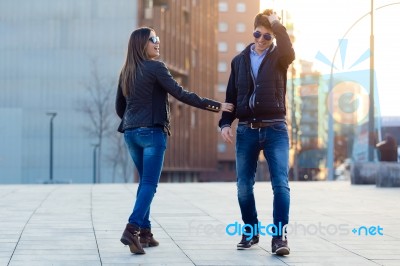 Young Couple In Love On The Street Stock Photo