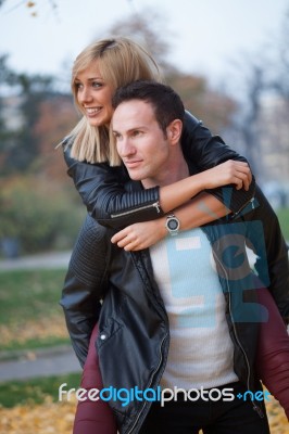 Young Couple In Park Stock Photo