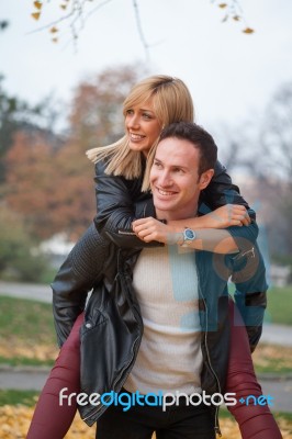 Young Couple In Park Stock Photo