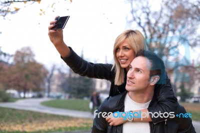 Young Couple In Park Stock Photo