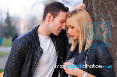 Young Couple In Park Stock Photo