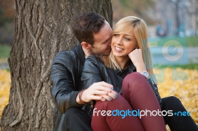 Young Couple In Park Stock Photo