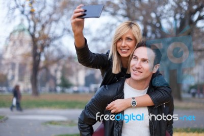 Young Couple In Park Stock Photo