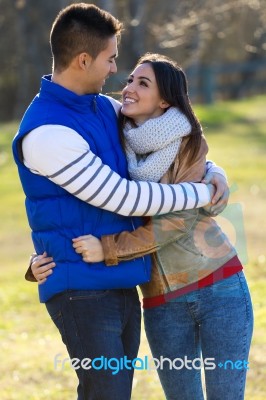 Young Couple In The Park Stock Photo