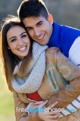 Young Couple In The Park Stock Photo