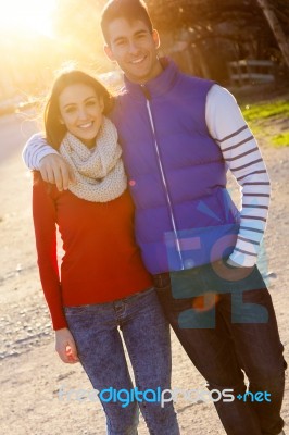 Young Couple In The Park Stock Photo