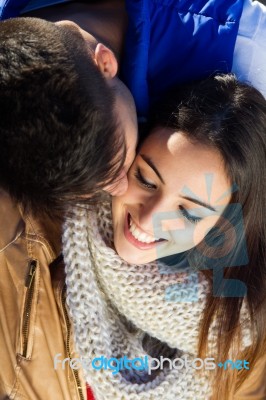 Young Couple In The Park Stock Photo