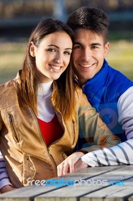 Young Couple In The Park Stock Photo