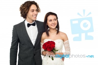 Young Couple Looking Outside Stock Photo