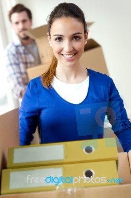 Young Couple Moving In New Home Stock Photo