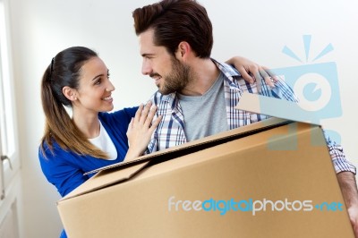 Young Couple Moving In New Home Stock Photo