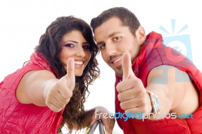 Young Couple Showing Thumb Up Stock Photo