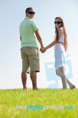 Young Couple Standing Stock Photo