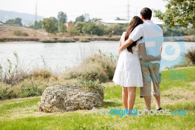 Young Couple Standing Stock Photo