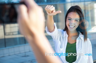 Young Couple Taking Photos With Mobile Stock Photo