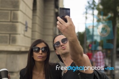 Young Couple Taking Selfies Stock Photo