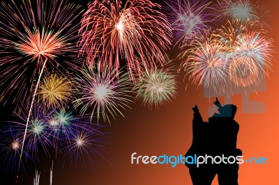 Young Couple Watching The Fireworks Stock Photo