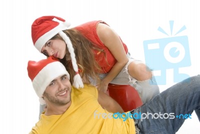 Young Couple Wearing Santa Hat Stock Photo