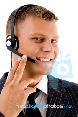 Young Customer Service Operating With Headset Stock Photo