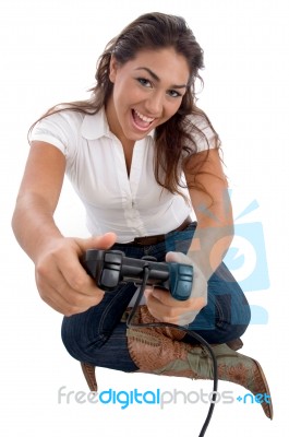 Young Cute Girl Playing Video Game Stock Photo