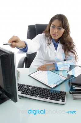 Young Doctor Pointing Aside Stock Photo