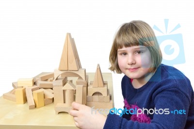 Young Dutch Girl Building Construction With Wooden Blocks Isolat… Stock Photo