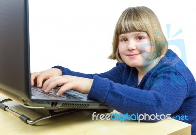 Young Dutch Girl Working On  Laptop Computer Stock Photo