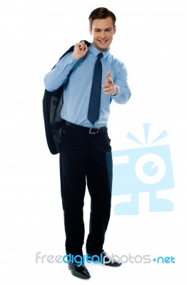 Young Executive Pointing Forward Stock Photo