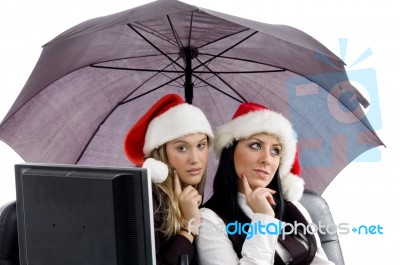 Young Executives Posing Together In Christmas Hat Stock Photo