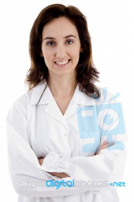 Young Female Doctor Posing With Her Arms Crossed Stock Photo