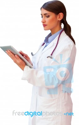 Young Female Doctor Using Digital Tablet Stock Photo