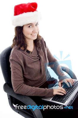 Young Female Typing On Laptop Stock Photo