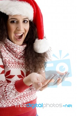 Young Female Wearing Christmas Hat Stock Photo