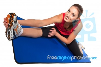 Young Fit Woman Exercising Stock Photo