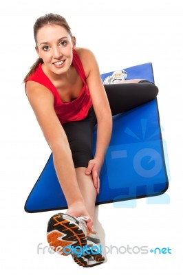 Young Fit Woman Exercising Stock Photo