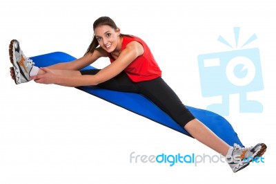 Young Fit Woman Exercising Stock Photo